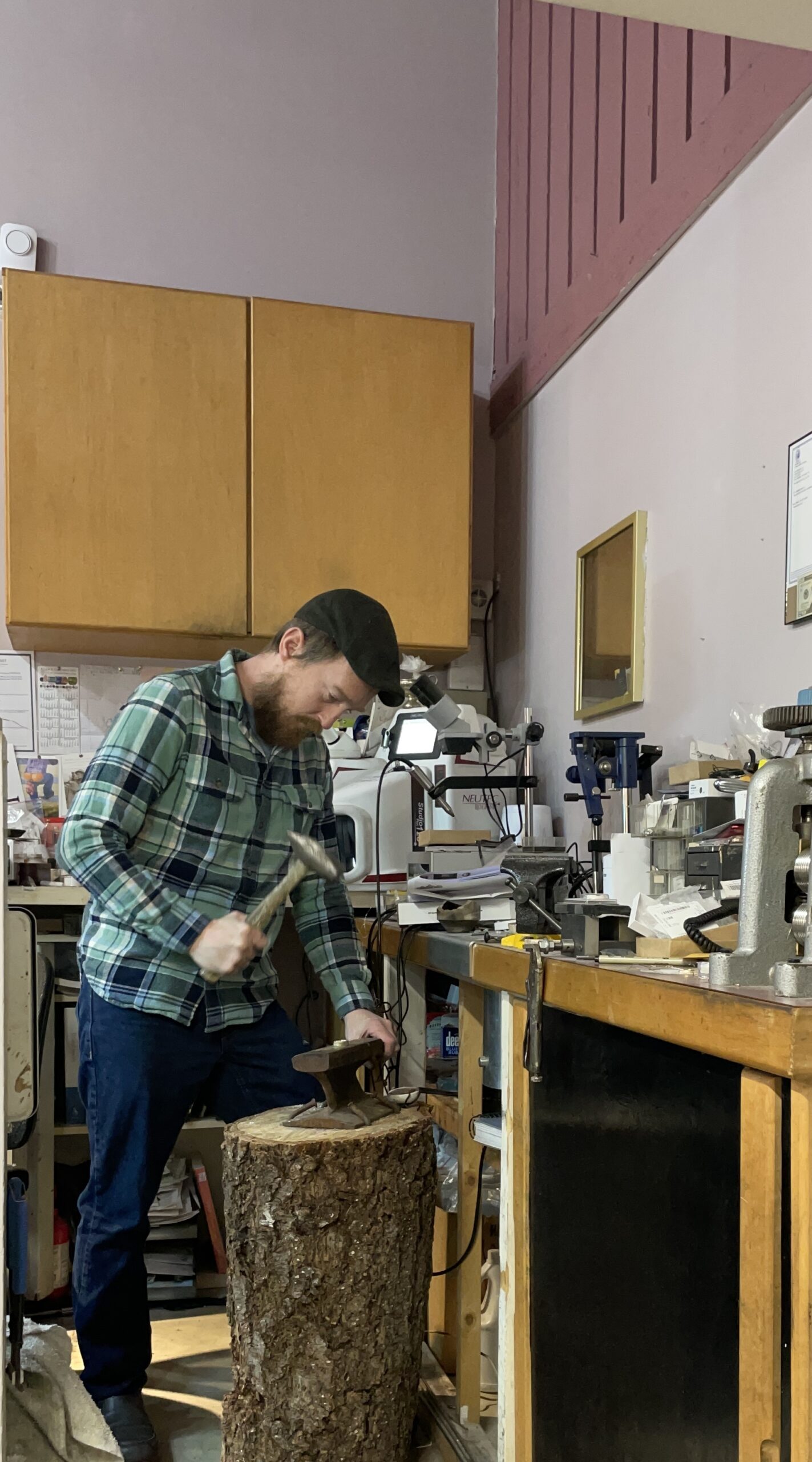 Jason E. Prescott at the workbench, crafting custom jewelry